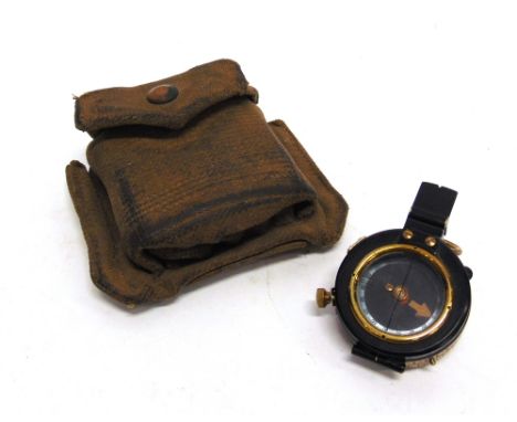 A BRITISH ARMY MK IX PRISMATIC MARCHING COMPASS  by M.D.S. of London, No.1095, in a webbing pouch.