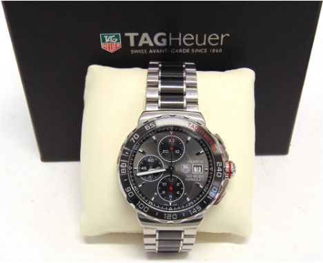 TAG HEUER, FORMULA 1, CALIBRE 16 a gentleman's stainless steel automatic bracelet chronograph watch, the grey dial, signed, w