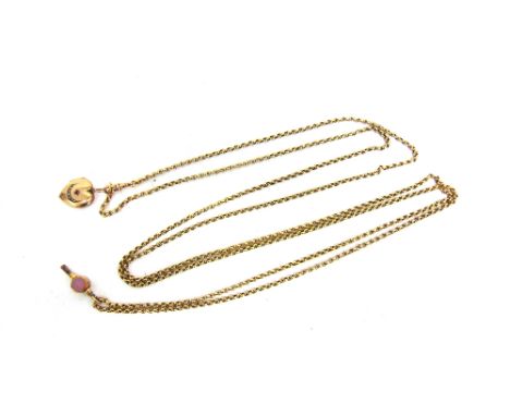 A GUARD CHAIN tagged '15c', 160cm long, with a heart locket and watch key attached, 31g gross