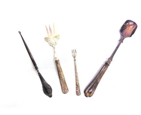 A CASED SET OF SIX SILVER CAKE FORKS  a cased silver spoon and pusher set, a silver handled button hook, cheese scoop, and br
