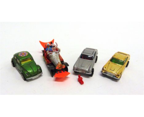 FOUR DIECAST MODELS  comprising a Corgi Junior James Bond Aston Martin, silver, with rarer large black unfoiled wheels, near 