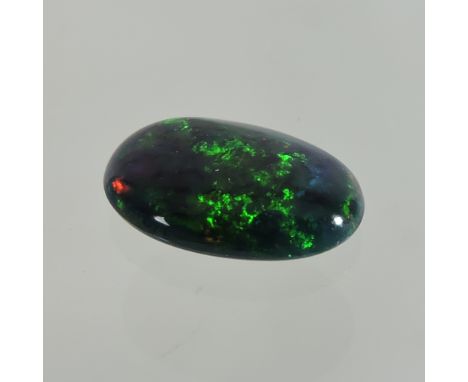 A black opal, approximately 1.5 carat, unmounted