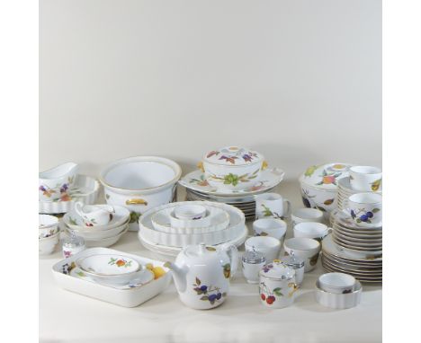 Two shelves of  Royal Worcester Evesham pattern tea and dinner wares