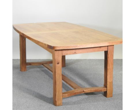 A modern light oak dining table, 202 x 107cm