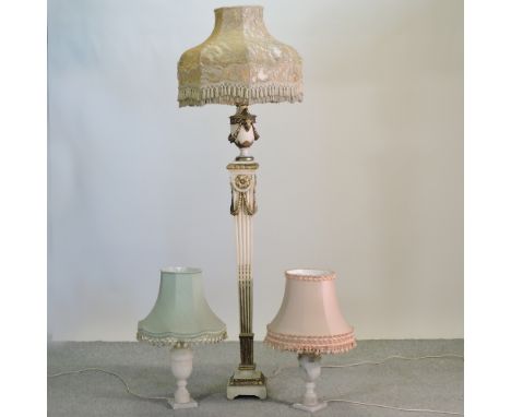 A Regency style cream and gold painted standard lamp and shade, 188cm high overall, together with a pair of marble table lamp