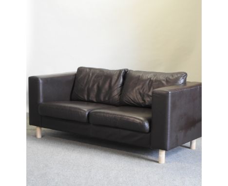 A brown leather upholstered two seater sofa, 185cm