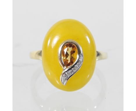 A 14 carat yellow jade citron and diamond ring, boxed