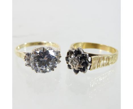 An 18 carat gold sapphire and diamond cluster ring, together with another