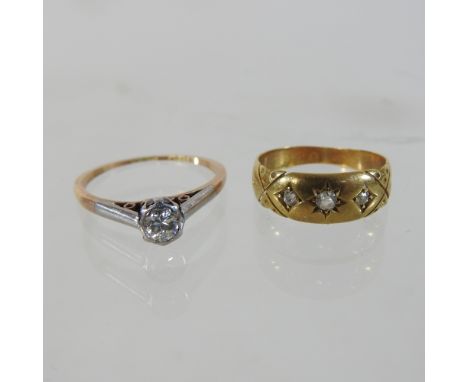 An 18 carat gold ladies dress ring, together with another