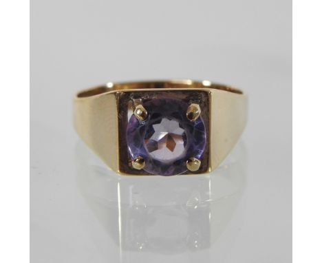 A 9 carat gold and amethyst ring, boxed