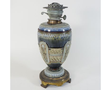 A 19th century Doulton Lambeth stoneware oil lamp, 38cm high