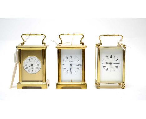 A 20th Century Bayard brass cased carriage clock, the white dial with Roman numerals in black, 14cms high with handle raised;