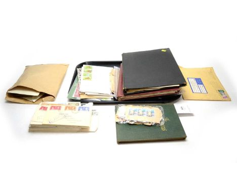 A collection of British and international stamps, comprising three stamp albums, containing a 1d. Black HJ with two margins a