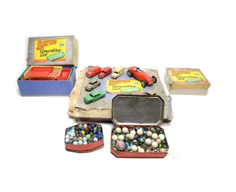 A collection of vintage toys and games, including: German CKO Rollosport 376 tinplate model car; seven Dinky Toys model cars;