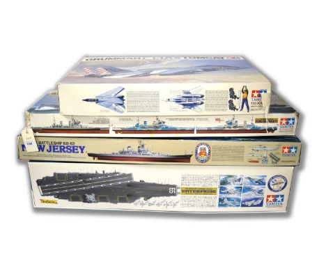 A selection of Tamiya scale model kits, including: 1:350 scale U.S. Aircraft Carrier CVN65 Enterprise; 1:350 scale British Ba