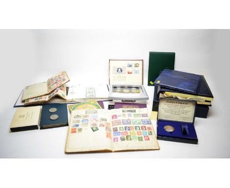 A collection of coins and stamps, including: album of Silver Jubilee Stamps of Queen Elizabeth II; album of Great Britains Me