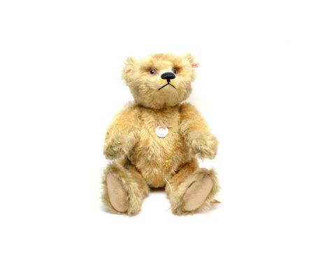 A Steiff Classic ‘New Mr Cinammon’ teddy bear, with button and label to ear.