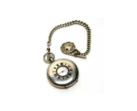 A Victorian silver cased half hunter pocket watch, the white enamel roman dial with subsidiary seconds aperture, fitted crown
