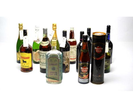 A selection of bottles of alcohol, including: a Bell’s Old Scotch Whisky; a Harvey's Bristol Cream Sherry, 75cl, 17.5%; a Bla