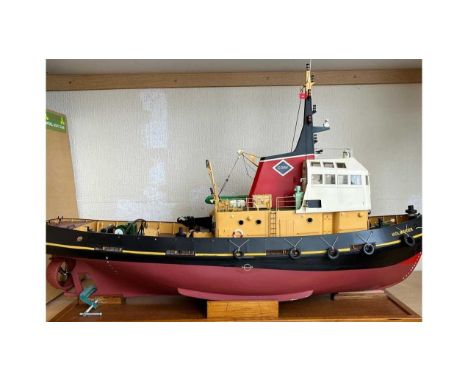 A scratch-built ship's model 'Holmsider', built by Allan Manson, the scale-built tug model fitted for radio control, superstr