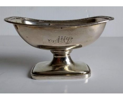A Georgian silver oblong salt boat with gadroon rim on a spreading foot, marks rubbed, 5.5 x 9.5 cm and an engine turned silv