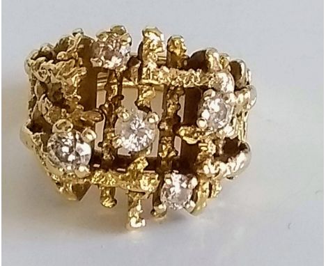 A mid -20th century bark and twig design diamond platinum and gold ring, stamped 18ct PLAT, size K, four diamonds each 0.05-0