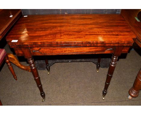 A George IV mahogany fold-over gate-leg card table 