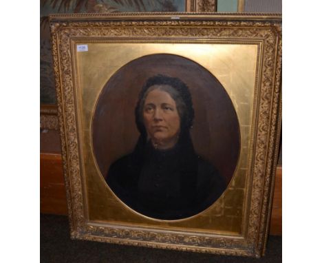 19th century school, a portrait of a lady, oil on canvas, framed in the oval in a gilt frame
