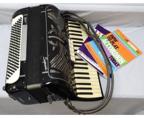 VINTAGE ITALIAN 'SOPRANI' ACCORDIONwith holding straps, and two accordion booklets