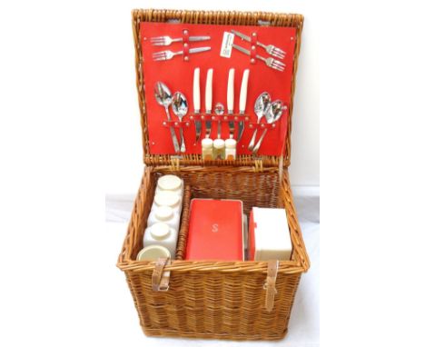RETRO HAWKER MARRIS 'SIRRAM' WICKER PICNIC HAMPERcontaining a selection of containers, bottles, cutlery and plates, with carr
