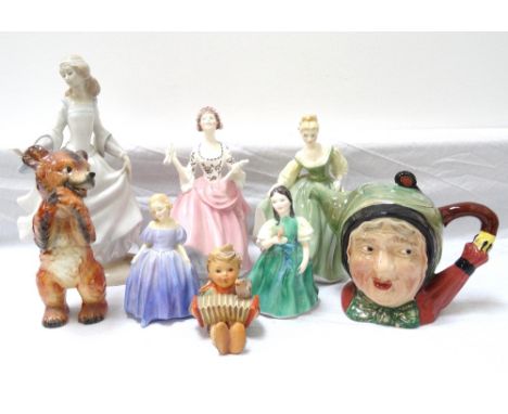 LLADRO FIGURINEnumber 4828, Daisa, 25cm high, four Royal Doulton figurines, Ballad Seller, HN 2266, 19cm high, Fair Lady, HN 