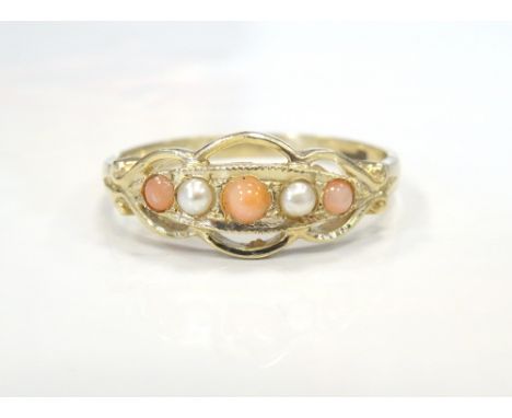 PRETTY CORAL AND PEARL RINGon nine carat gold shank with pierced setting, ring size O-P