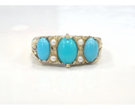 TURQUOISE AND PEARL RINGthe three oval cabochon turquoise stones separated by pearls, on nine carat gold shank, ring size Q