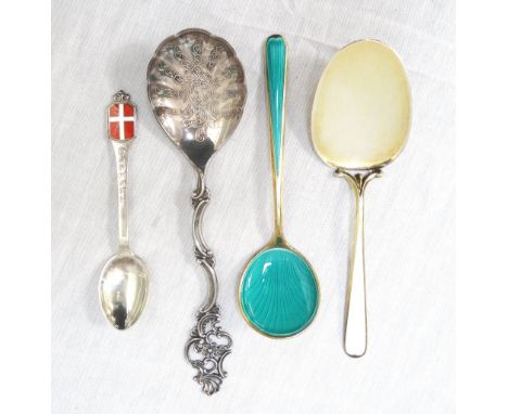 TWO NORWEGIAN SILVER GILT AND ENAMEL SPOONSmarked for 'Thune' Oslo, 12.5cm and 11.9cm long, a Danish silver and enamel spoon 