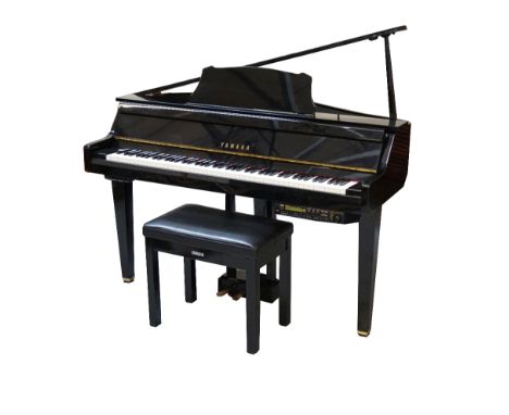 'YAMAHA DISKLAVIER' DIGITAL PIANOin a bright ebonised case on tapering metal legs together with the DKC 500R control unit and