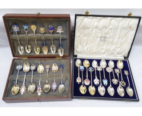 TWENTY FIVE SILVER AND ENAMEL COLLECTORS SPOONSdepicting Peebles, Montrose, Inverness, Dumbarton, Glasgow, Pollokshaws, Crief