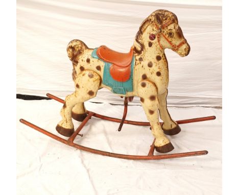 VINTAGE CHILD'S METAL ROCKING HORSEof multi-piece construction, marked 'Made in England', 79cm high and 102cm long