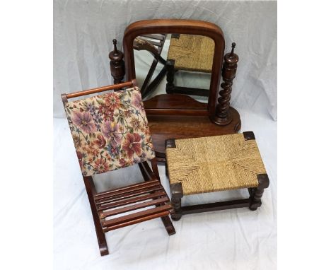 VICTORIAN MAHOGANY ADJUSTABLE DRESSING MIRRORthe mirror raised on finial topped barley twist supports, with shaped base on bu