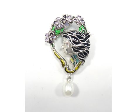 ART NOUVEAU STYLE SILVER BROOCHthe woman's head and flowers with colourful enamel style decoration, with pearl drop