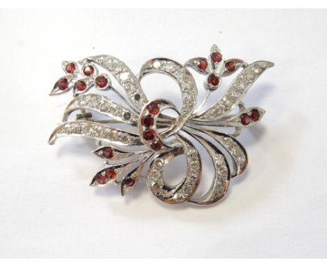 DIAMOND AND RUBY FLORAL SPRAY BROOCHset in unmarked high carat white gold, diamonds totalling approximately 1.50 carats, tota