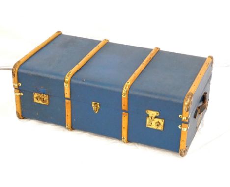 'THE VIKING' TRAVELLING TRUNKwith wood banding, leather side carrying handles and vintage travel labels, 34cm high x 92cm wid