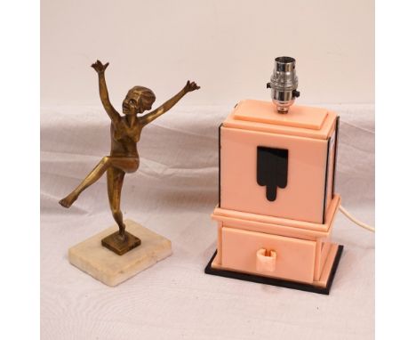 ART DECO BAKELITE LAMP BASEwith lower single drawer, 27cm high (including fitment), and a period metal dancing female nude fi