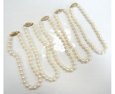 FIVE CULTURED PEARL BRACELETSall will pierced nine carat gold clasps (5)