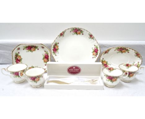 ROYAL ALBERT 'OLD COUNTRY ROSES' PART TEA SERVICEcomprising six cups; two cakeplates; dish; cake slice with box; shelf tray w