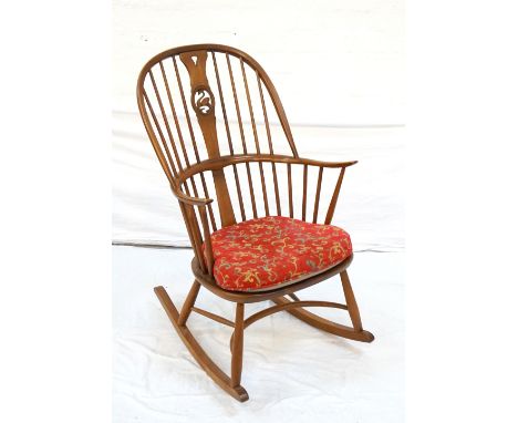 'ERCOL' ELM AND ASH ROCKING CHAIRwith a hoop stick back and carved central splat