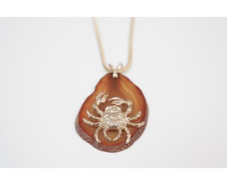 Stone pendant with 18ct yellow gold crab, on 18ct yellow gold Spiga chain length approx 26 inches. Total item weight approxim