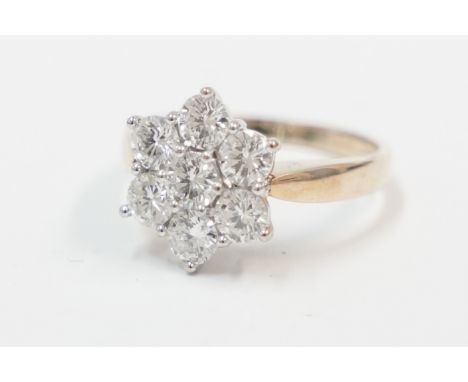 18ct yellow and white gold cluster ring, set with 7 round brilliant Cut Diamonds, approx. 1.58cts total weight. Size L. Total