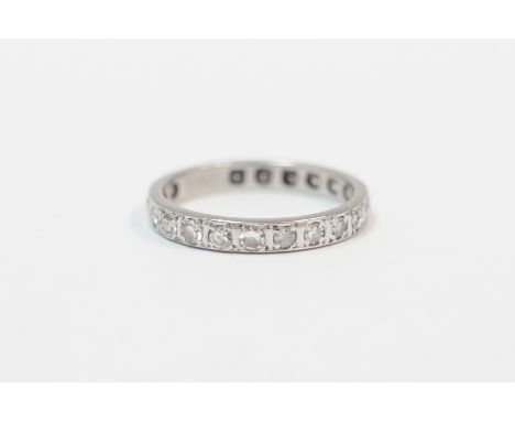 White metal, possibly platinum Diamond set full eternity ring. Size L. Total item weight approximately 2.12 grams