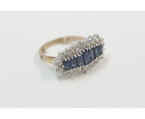 18ct yellow and white gold ring, set with 7 Baguette Sapphires, surrounded by 18ct round Diamonds, approx.1.25cts total weigh