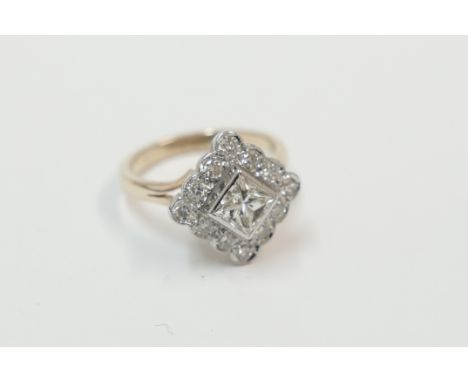 18ct yellow and white gold dress ring, set with centre Princess Cut Diamond, approx. 0.76cts, surrounded by 12 round brillian